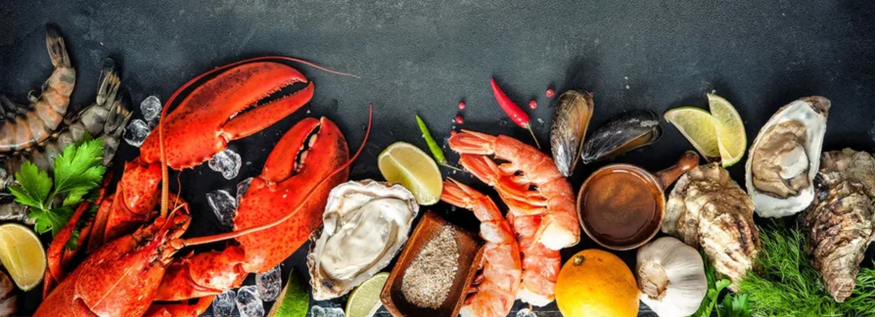 Assorted seafood platter featuring lobster and oysters