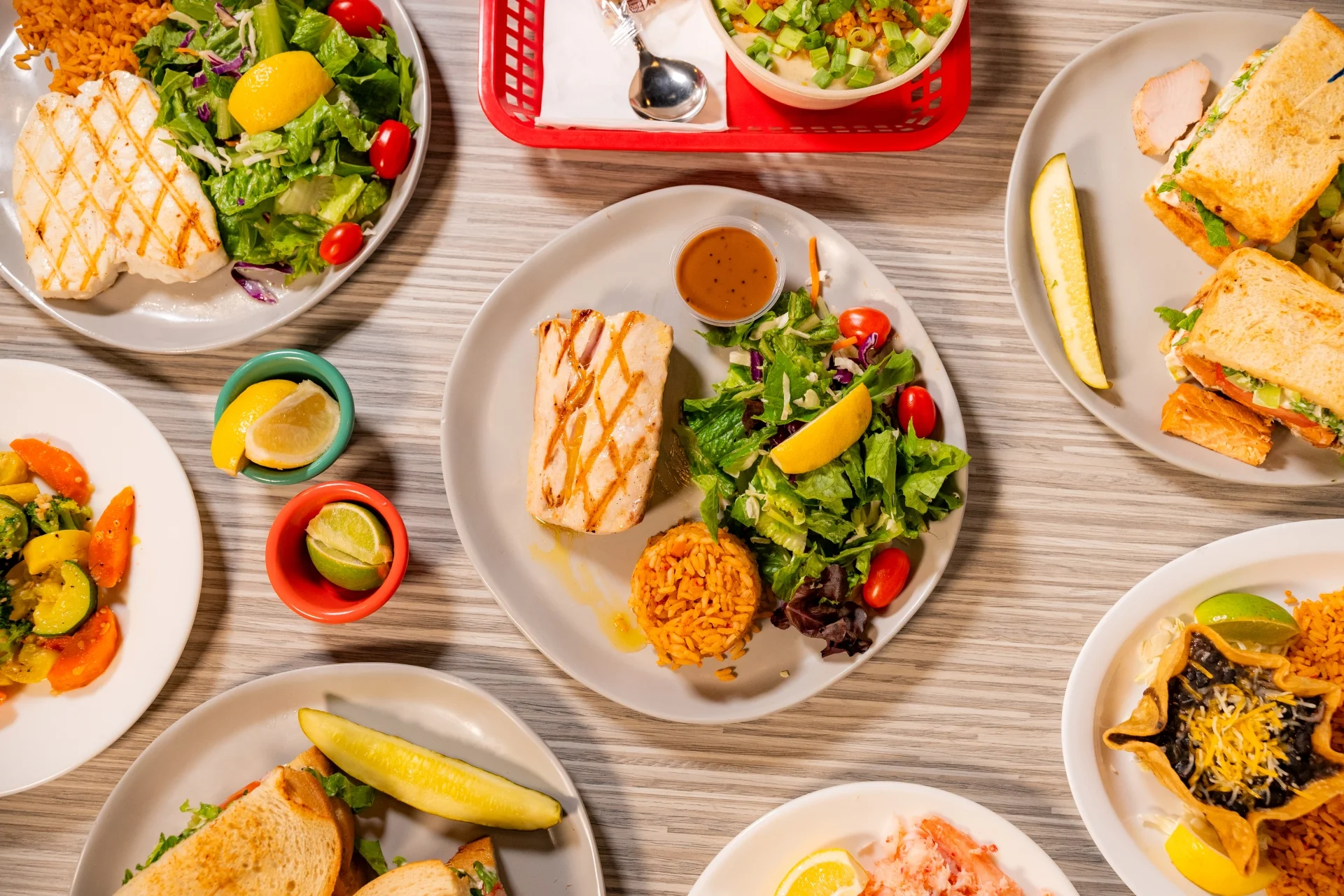 A beautifully arranged seafood platter with various fish dishes.