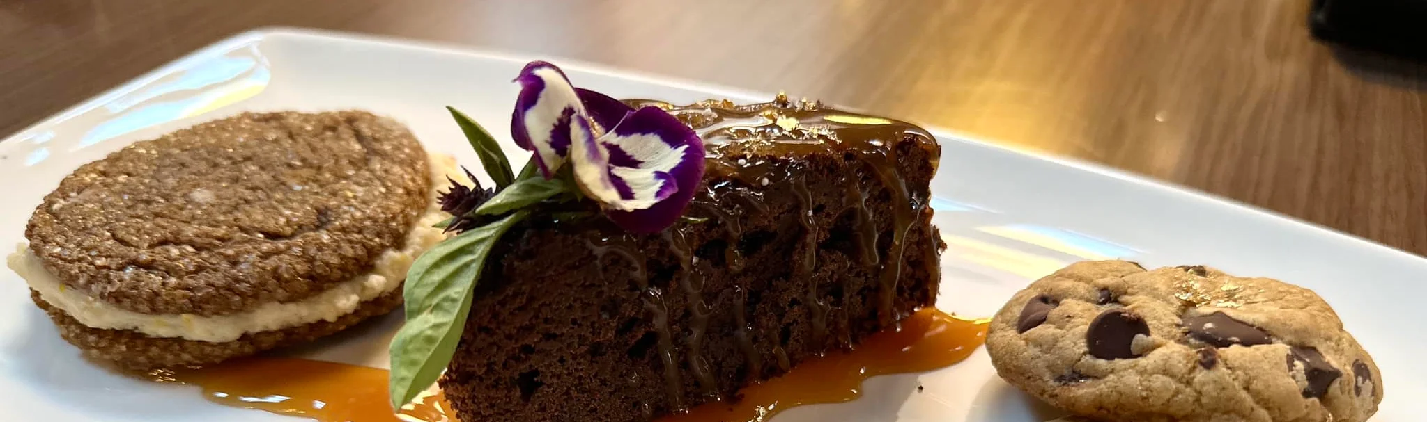Decadent chocolate cake with cookies and caramel sauce