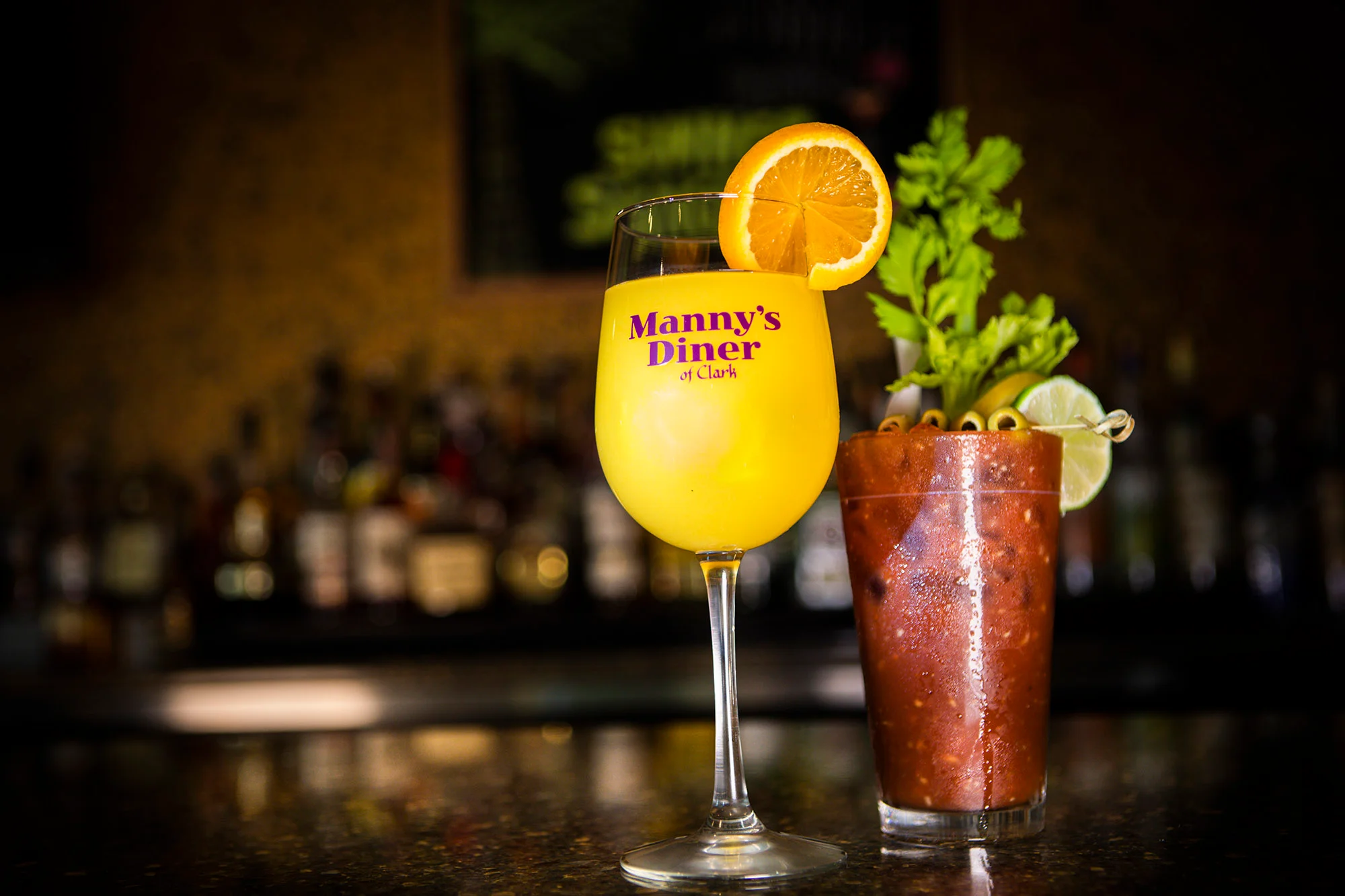 Colorful cocktails at a vibrant diner bar