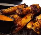 Crispy buffalo chicken wings with dipping sauce