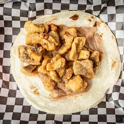 A tortilla loaded with Villa Arcos specialty