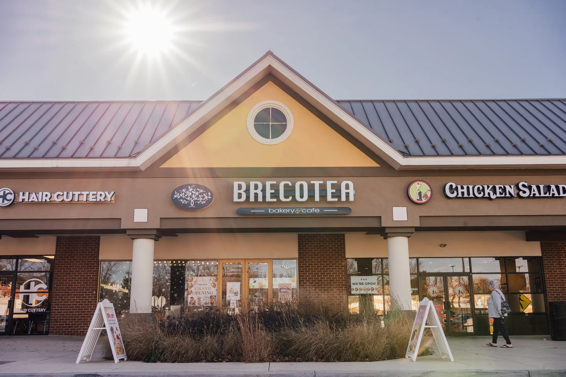 Exterior view of Brecotea bakery and cafe with sunny ambiance