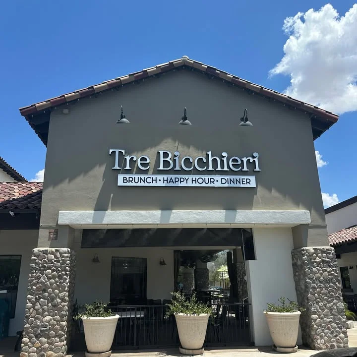 Exterior view of Tre Bicchieri restaurant with outdoor seating