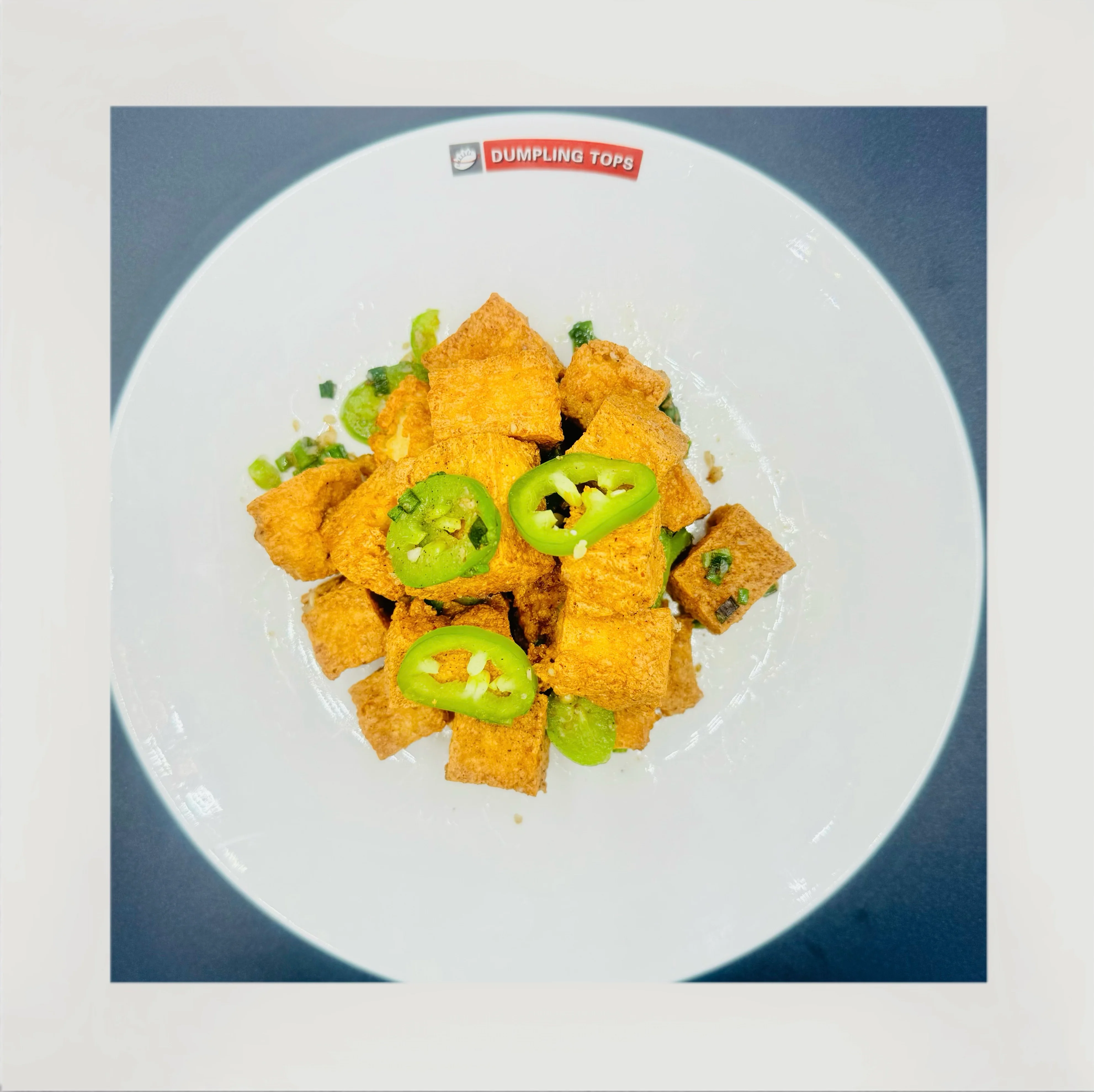 Crispy tofu cubes with jalapeños