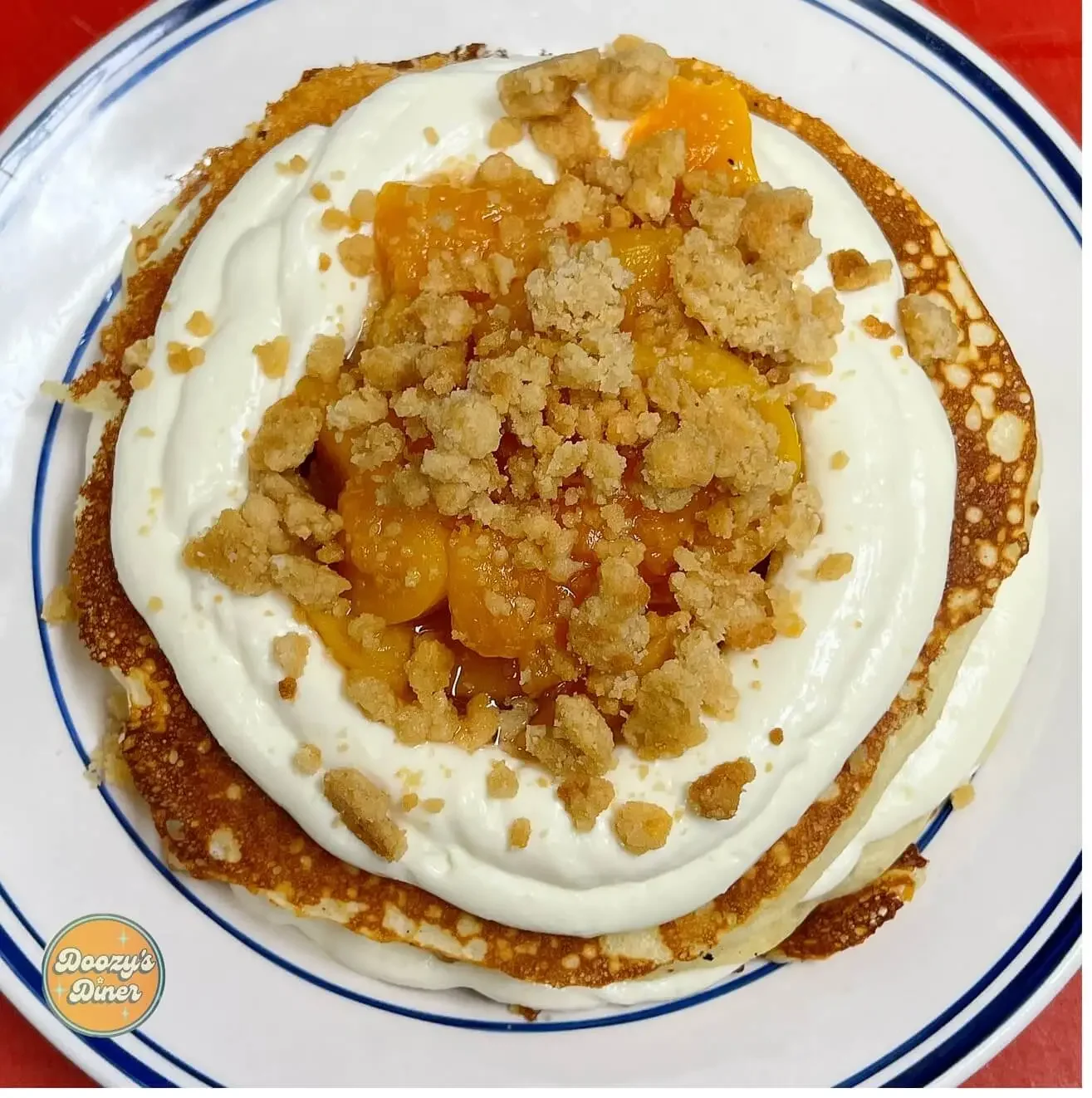 Peaches and cream pancakes from Doozy's Diner a breakfast brunch restaurant in Catonsville,MD