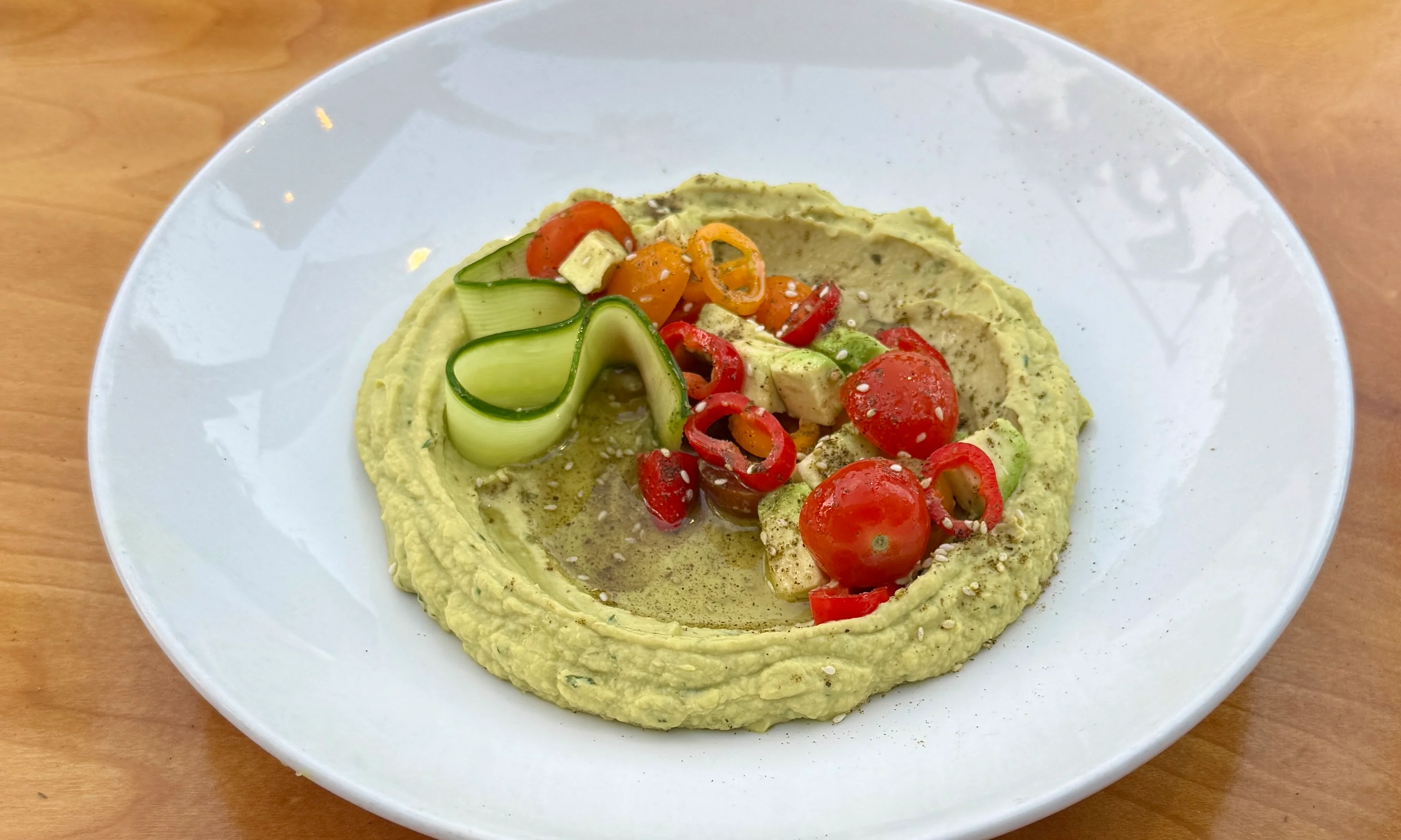Mediterranean avocado hummus with fresh vegetables