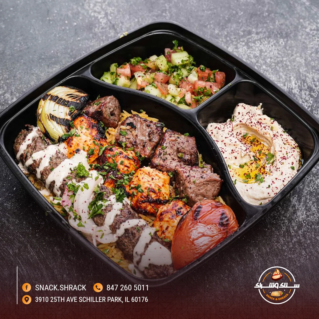Mediterranean mixed grill platter with kebabs and hummus