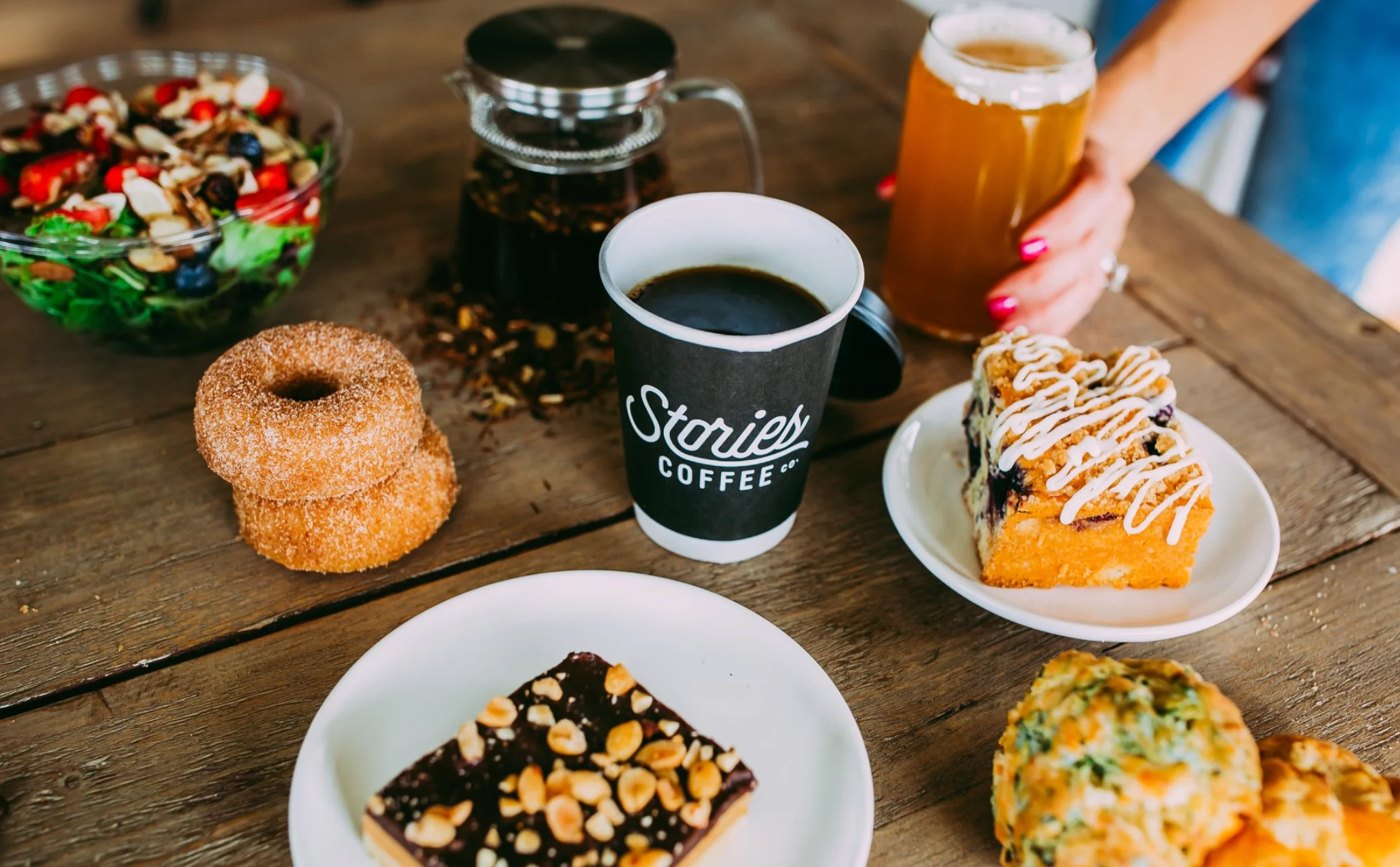 Coffee and pastries on a rustic table