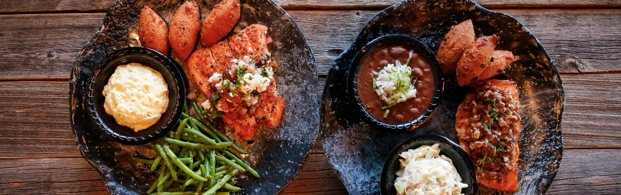Southern-style grilled salmon platter with sides