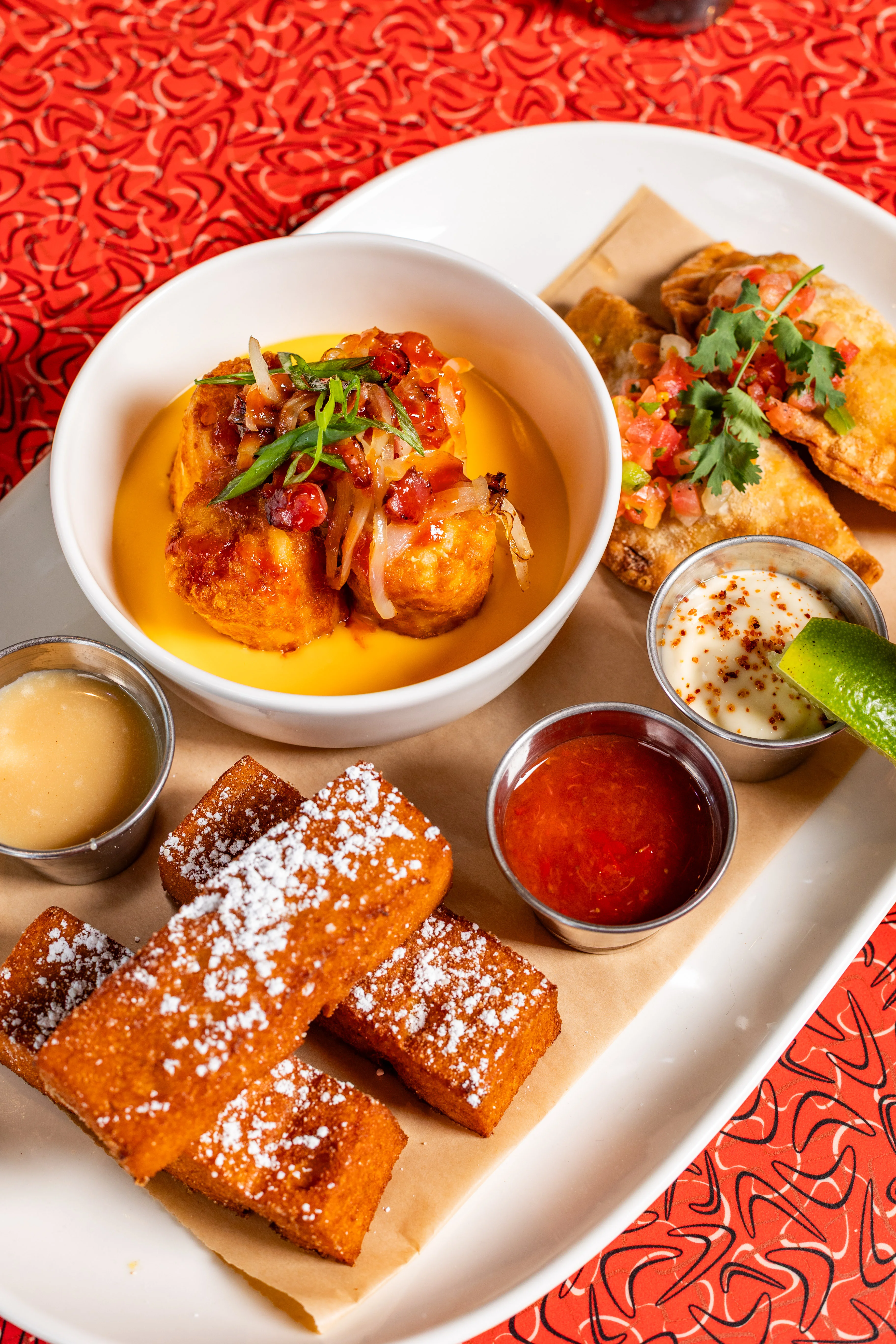 Southern-style cornbread with dipping sauces and savory bites