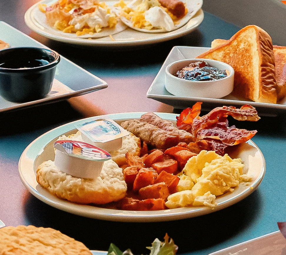 A vibrant brunch buffet featuring a variety of dishes and fresh ingredients.