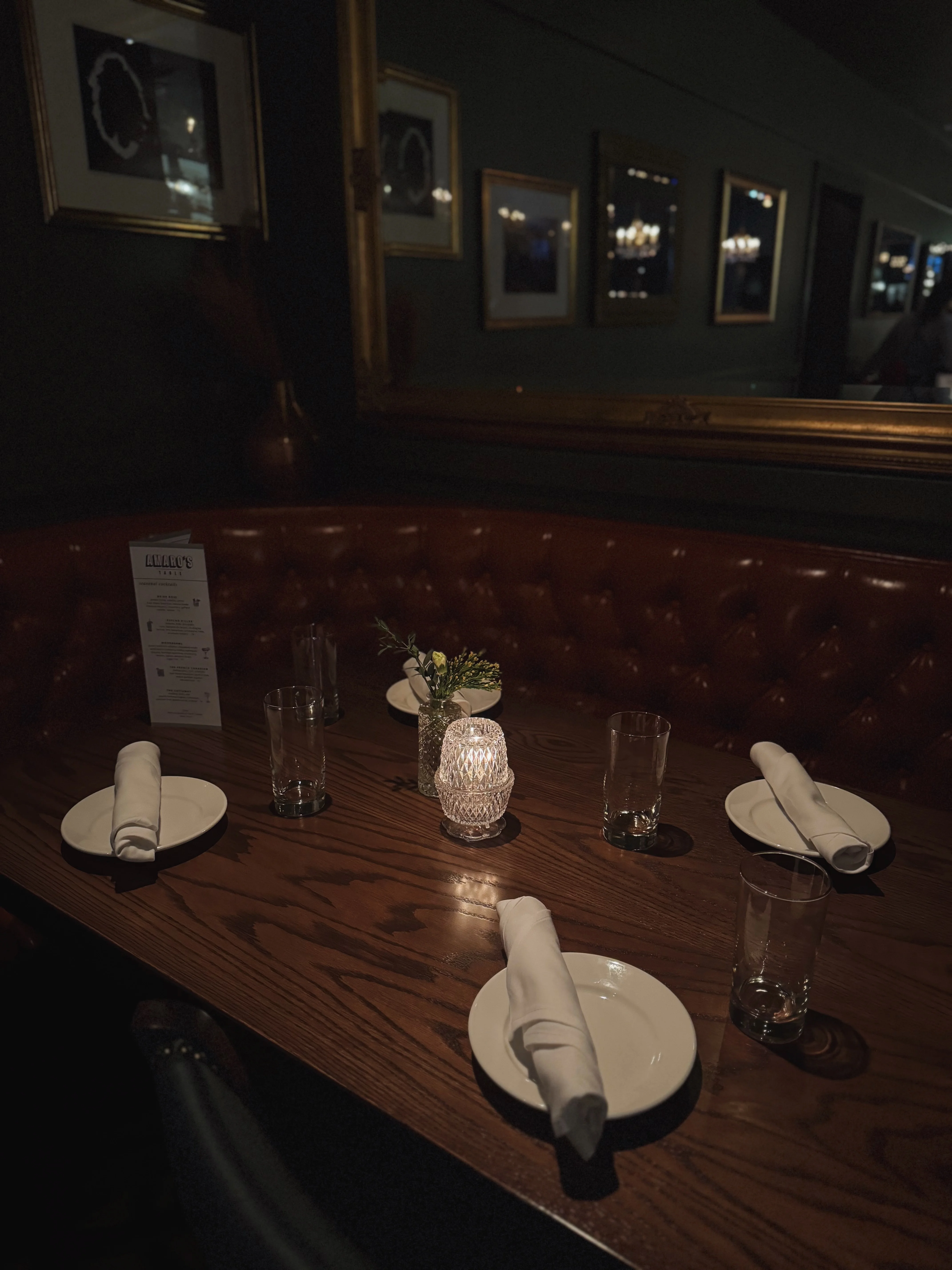 Cozy restaurant table set for dining with warm lighting