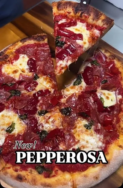 Pepperosa pizza with vibrant toppings and melted cheese