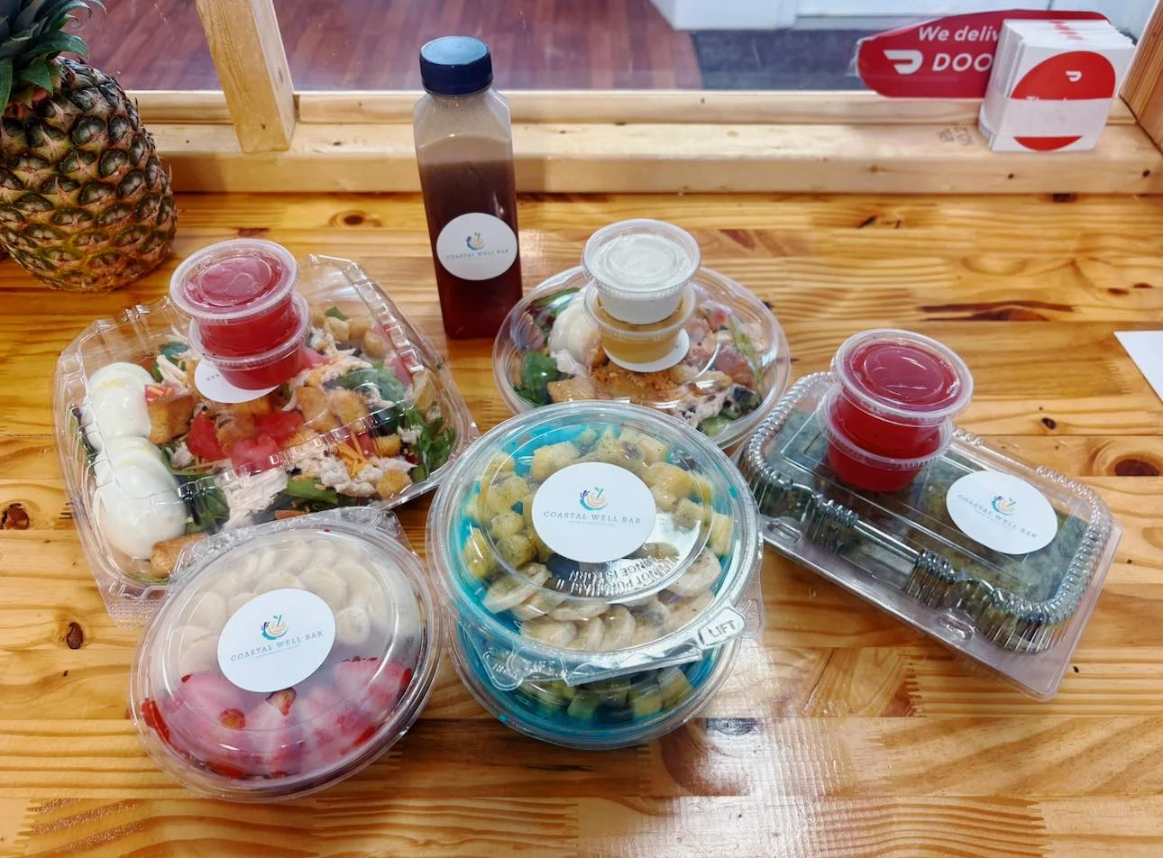 Assorted healthy bowls from a coastal wellness bar