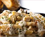 Creamy chicken alfredo pasta with herbs