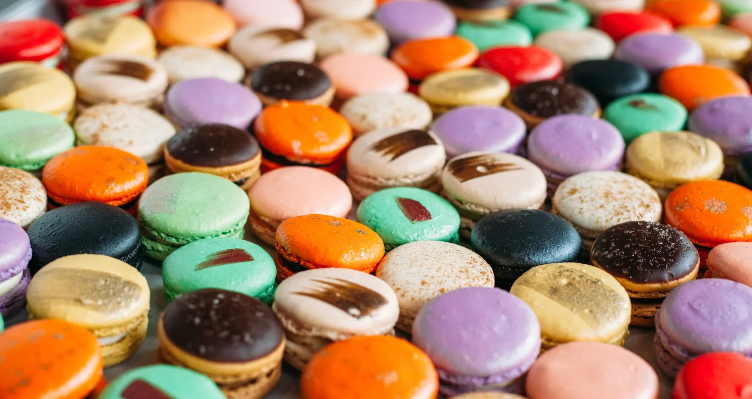 Colorful assortment of French macarons on display