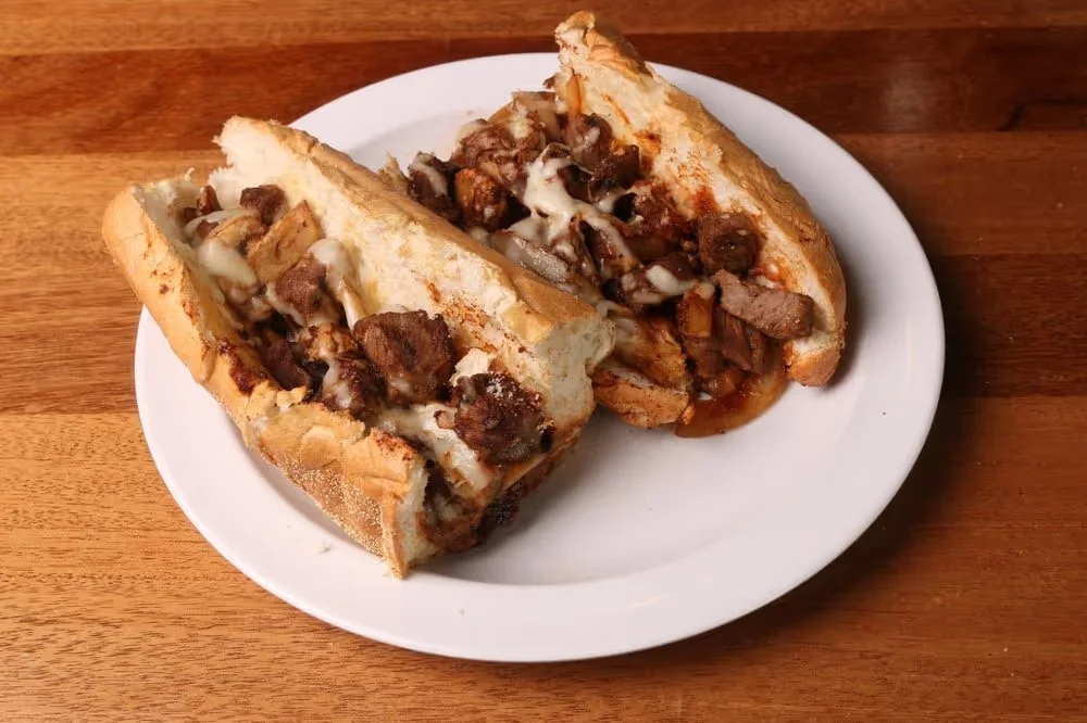 Delicious gourmet burger with fresh toppings on a wooden table