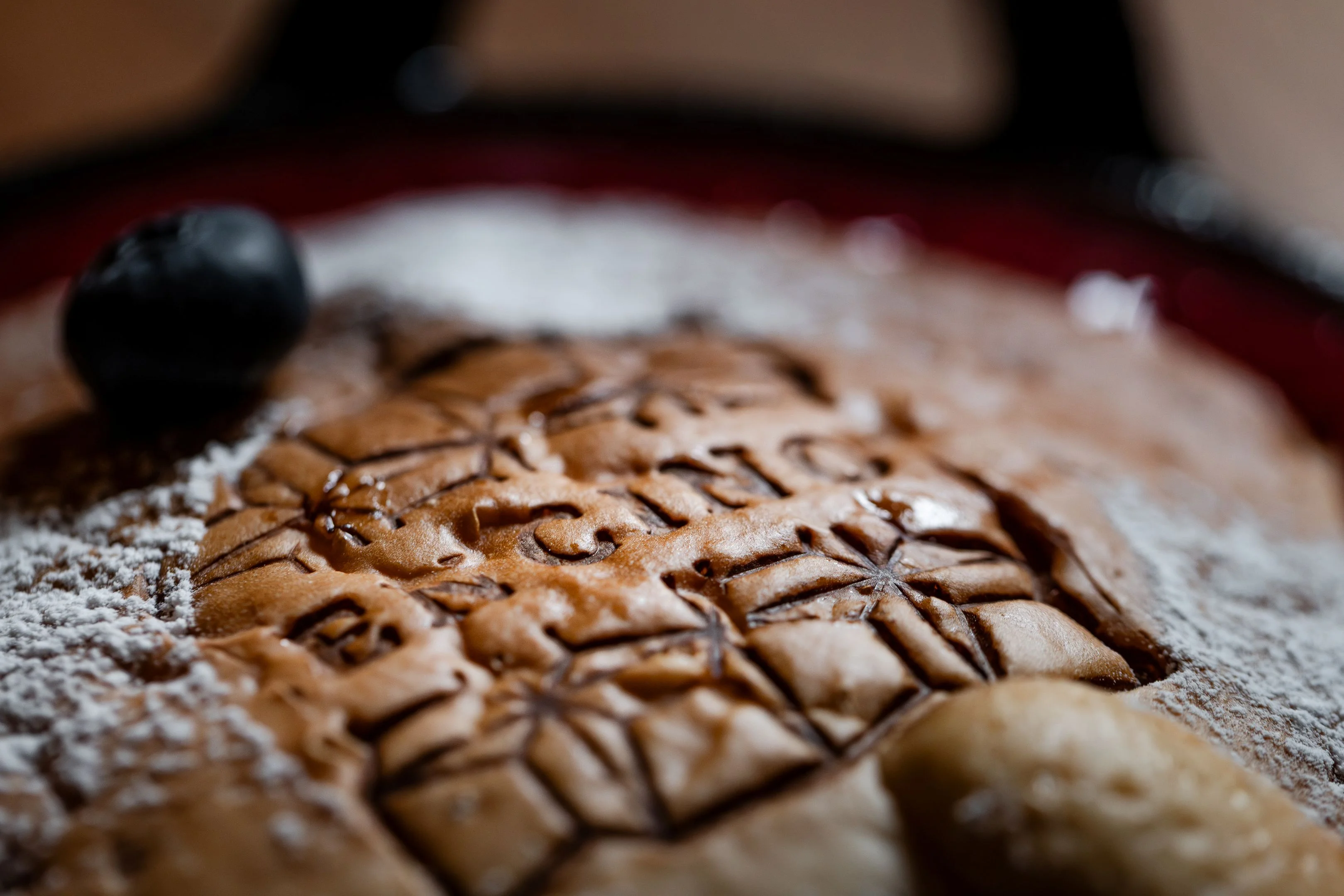 Delicious pancake with powdered sugar and blueberry garnish