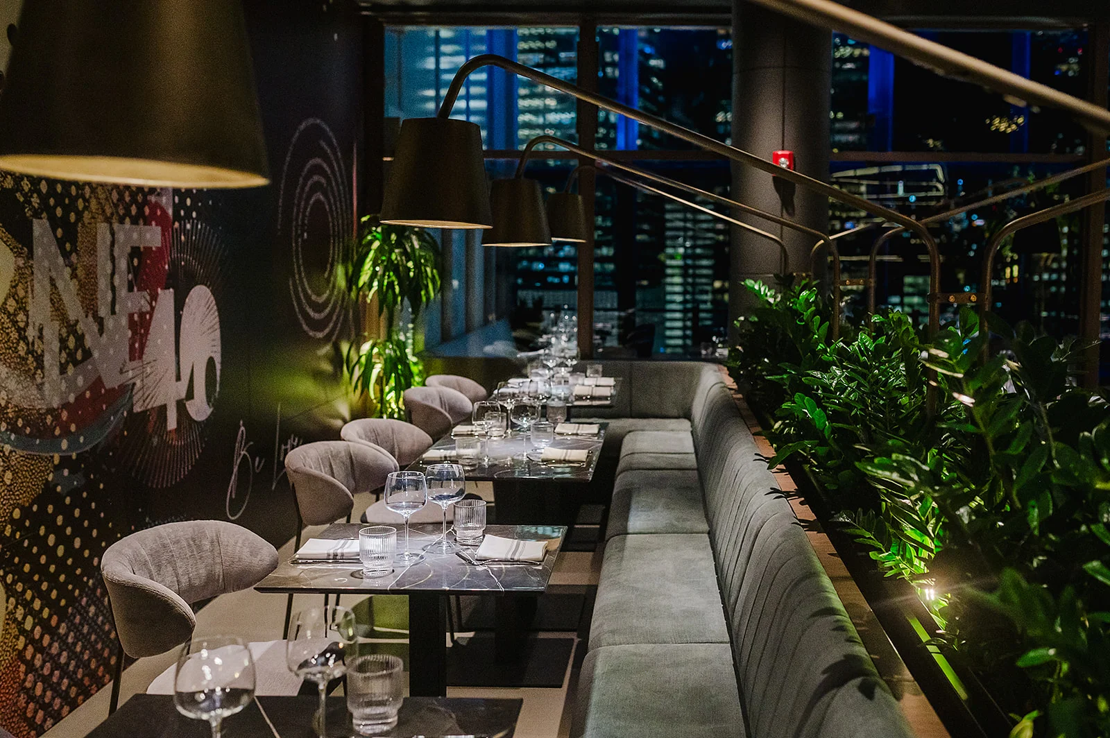 Chic restaurant interior with modern decor and city views