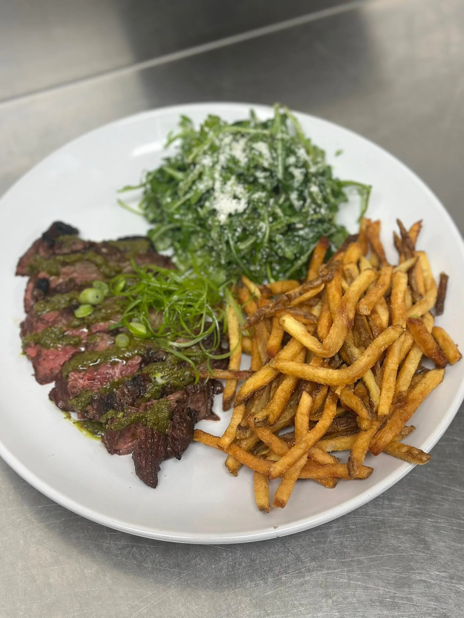 Delicious gourmet burger with fresh toppings on a wooden table