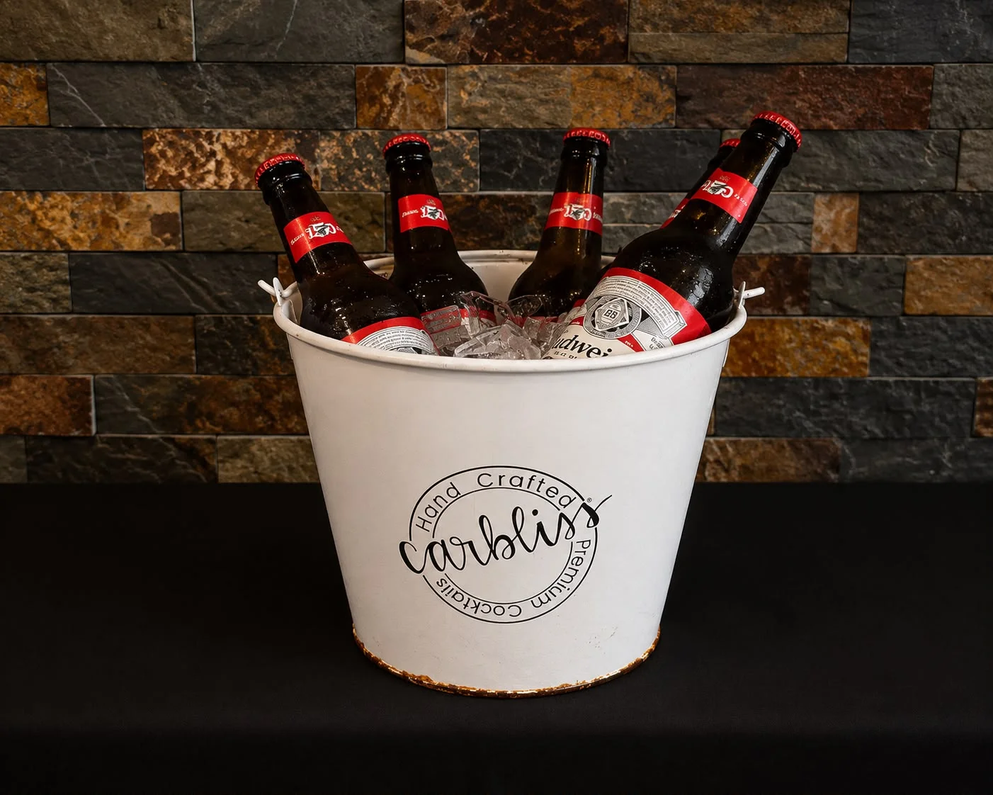 Chilled beer bucket with ice at a restaurant