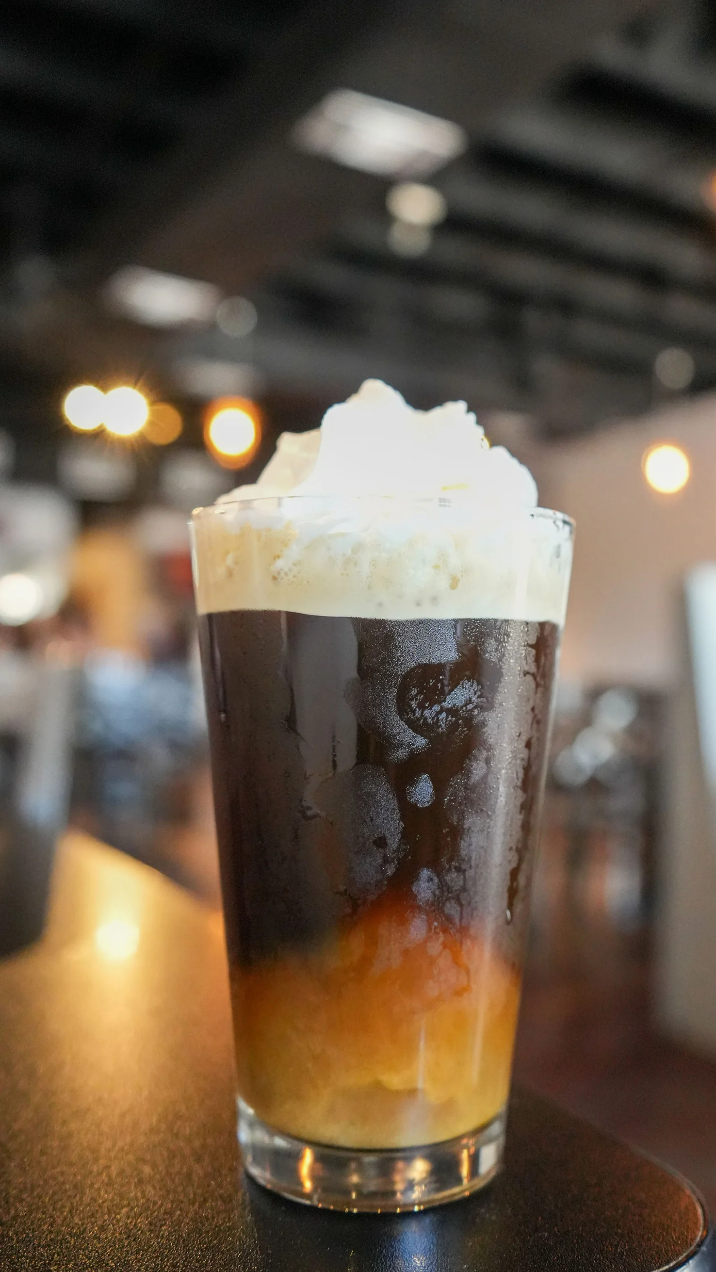 Iced coffee float with whipped cream