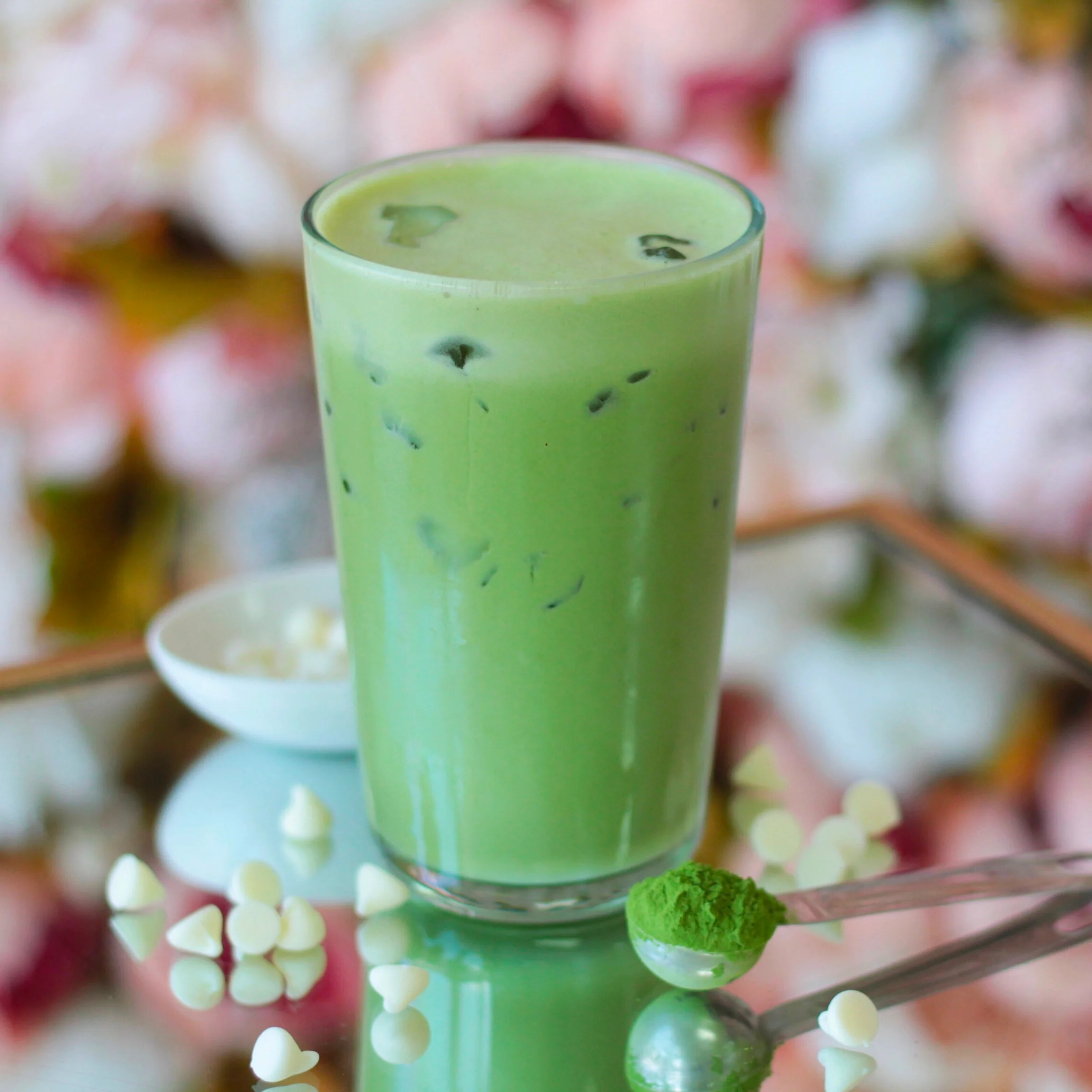 Iced matcha latte served in a tall glass