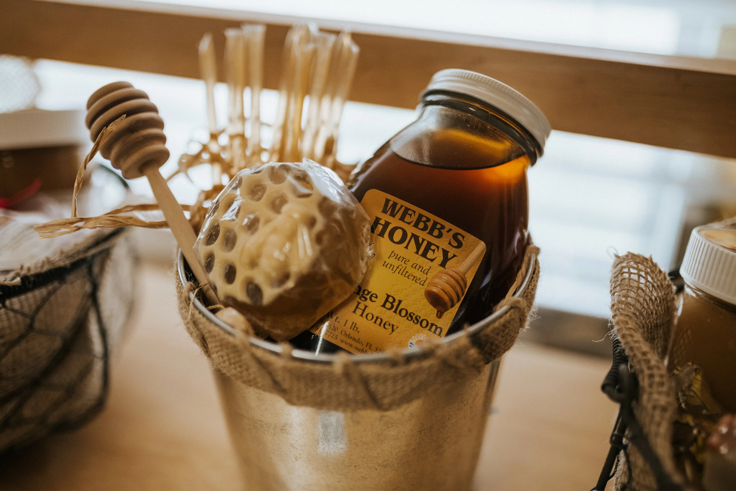 Artisan honey collection in a rustic display