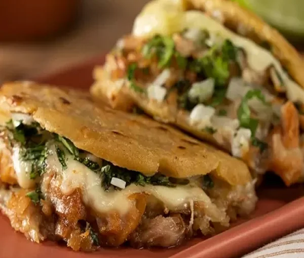 Delicious Salvadoran pupusas filled with cheese and herbs