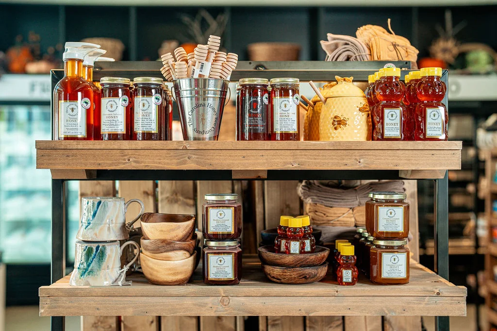 Display of assorted honey products and kitchenware
