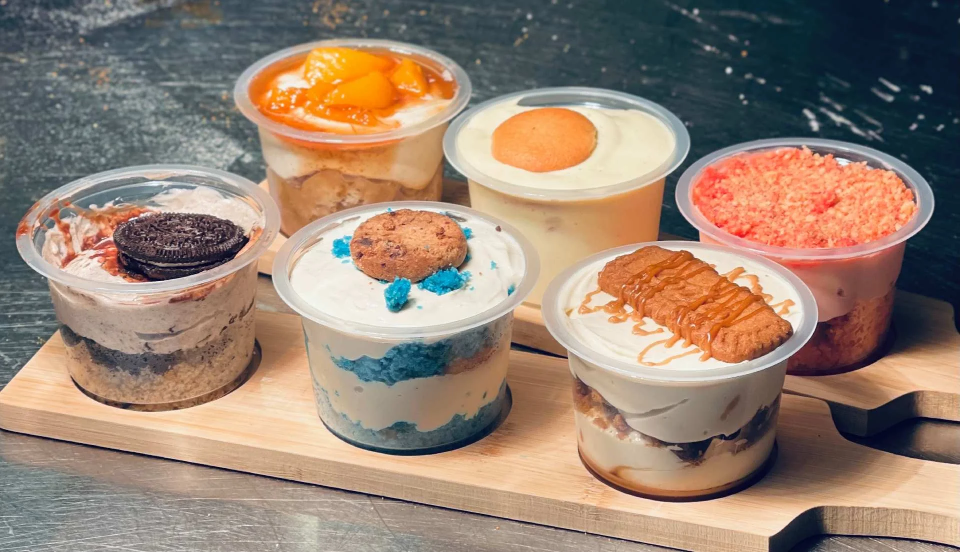 Assorted dessert cups featuring layered treats