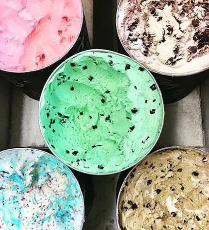 Colorful selection of ice cream flavors in bowls