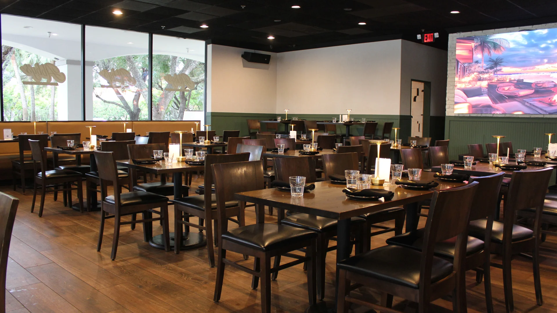 Modern restaurant interior with wooden tables and cozy lighting