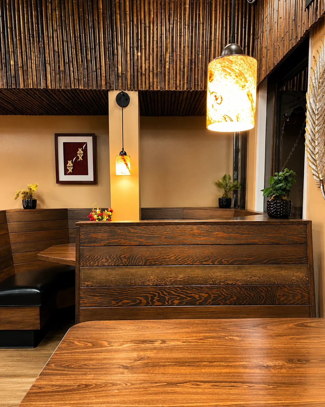 Cozy restaurant interior with wooden decor and warm lighting