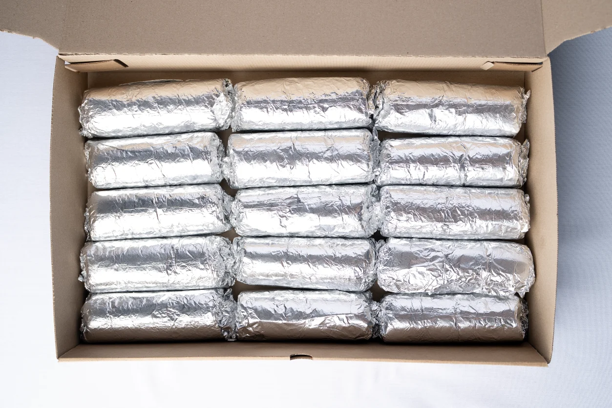 Box of wrapped burritos ready for serving