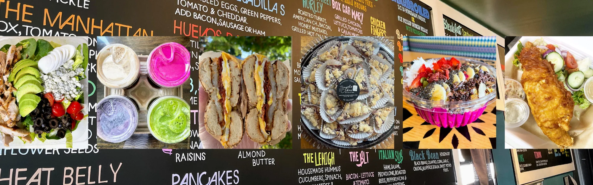 Variety of colorful dishes including salads and bagels in a vibrant café setting