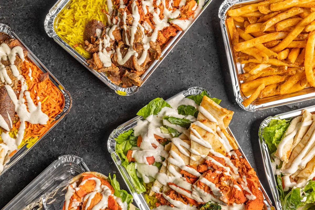 Mediterranean chicken platter with rice and sauce