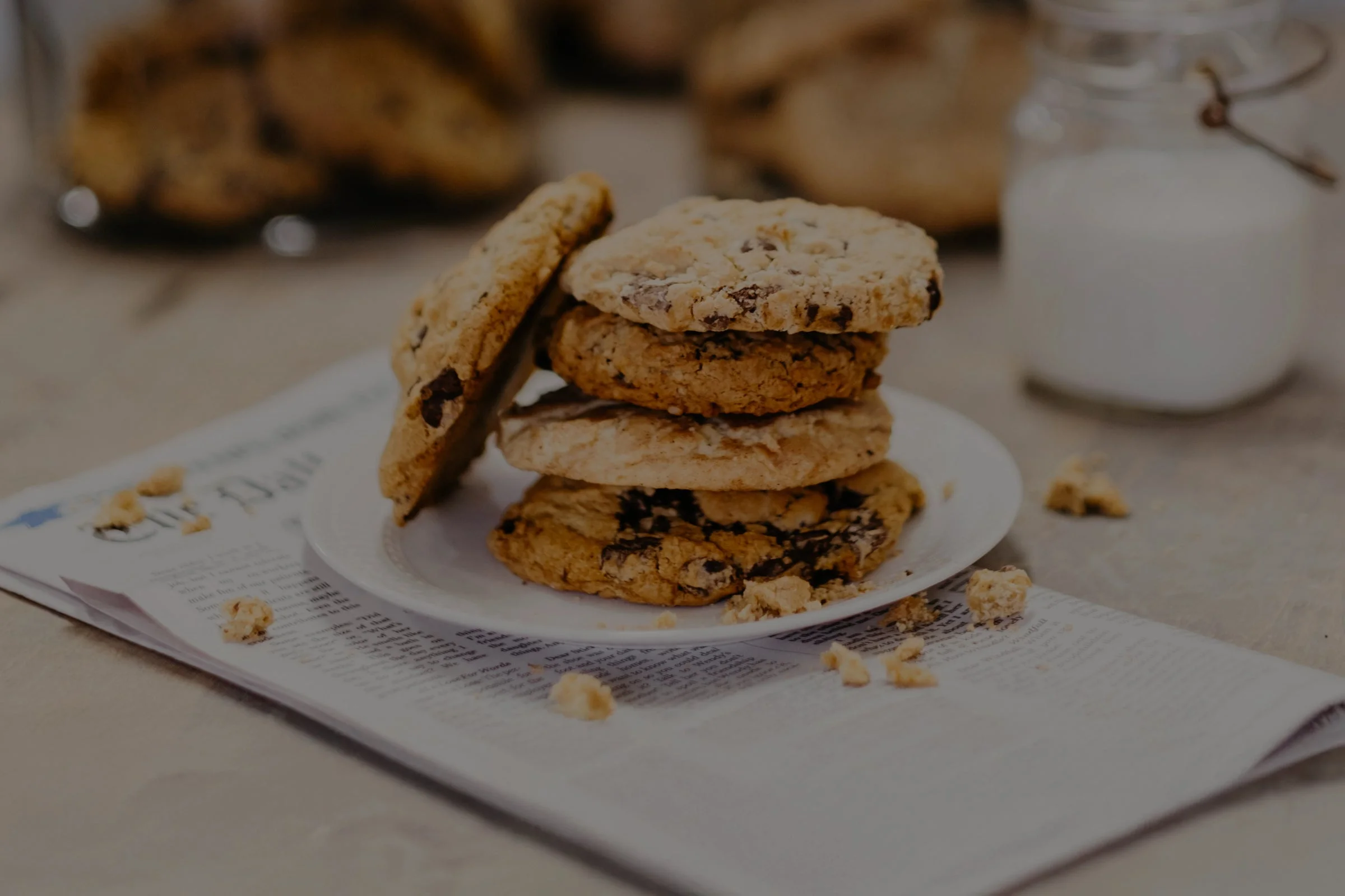 Freshly baked chocolate chip cookies on a plate