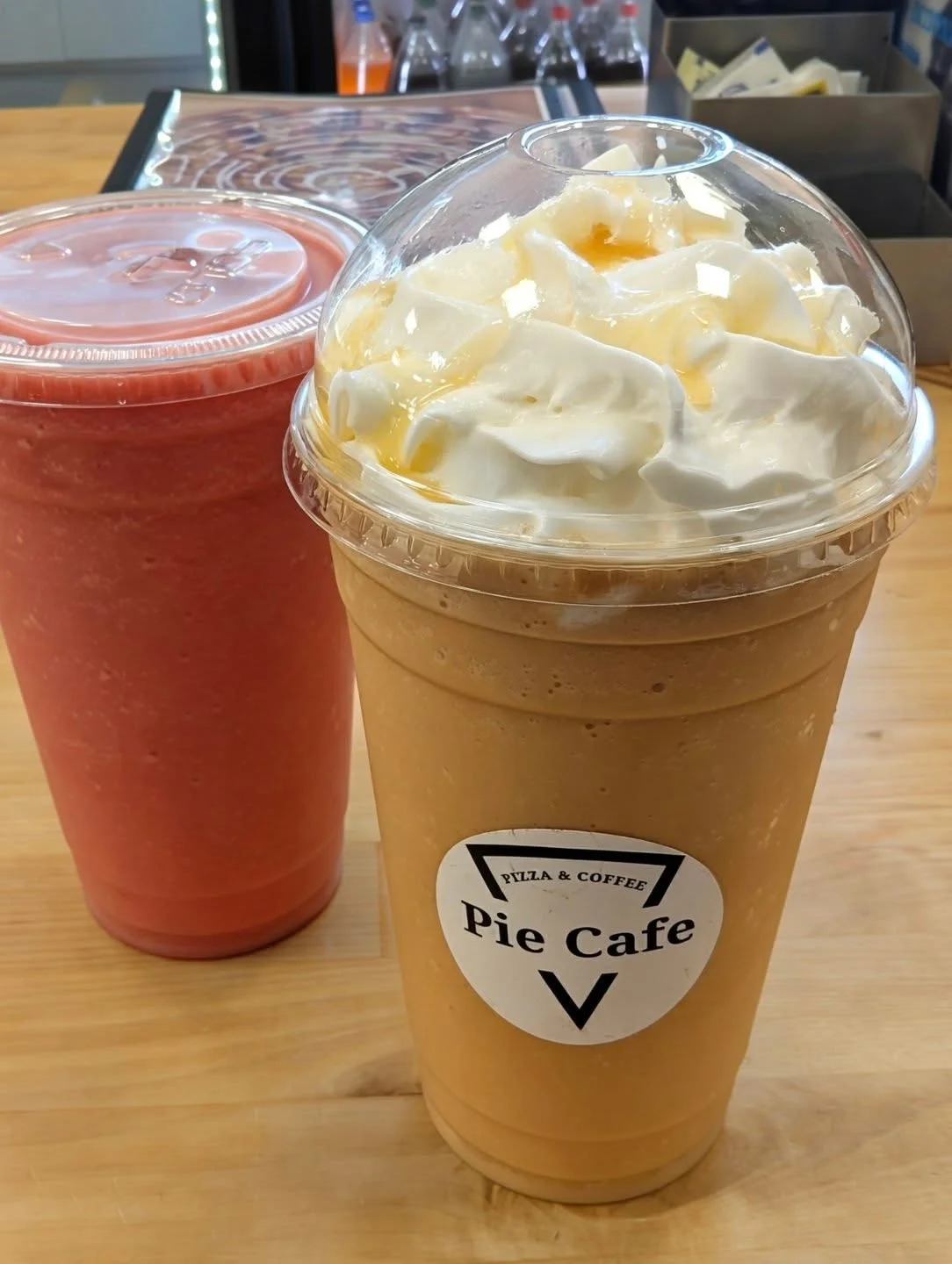 Refreshing iced coffee beverage topped with whipped cream