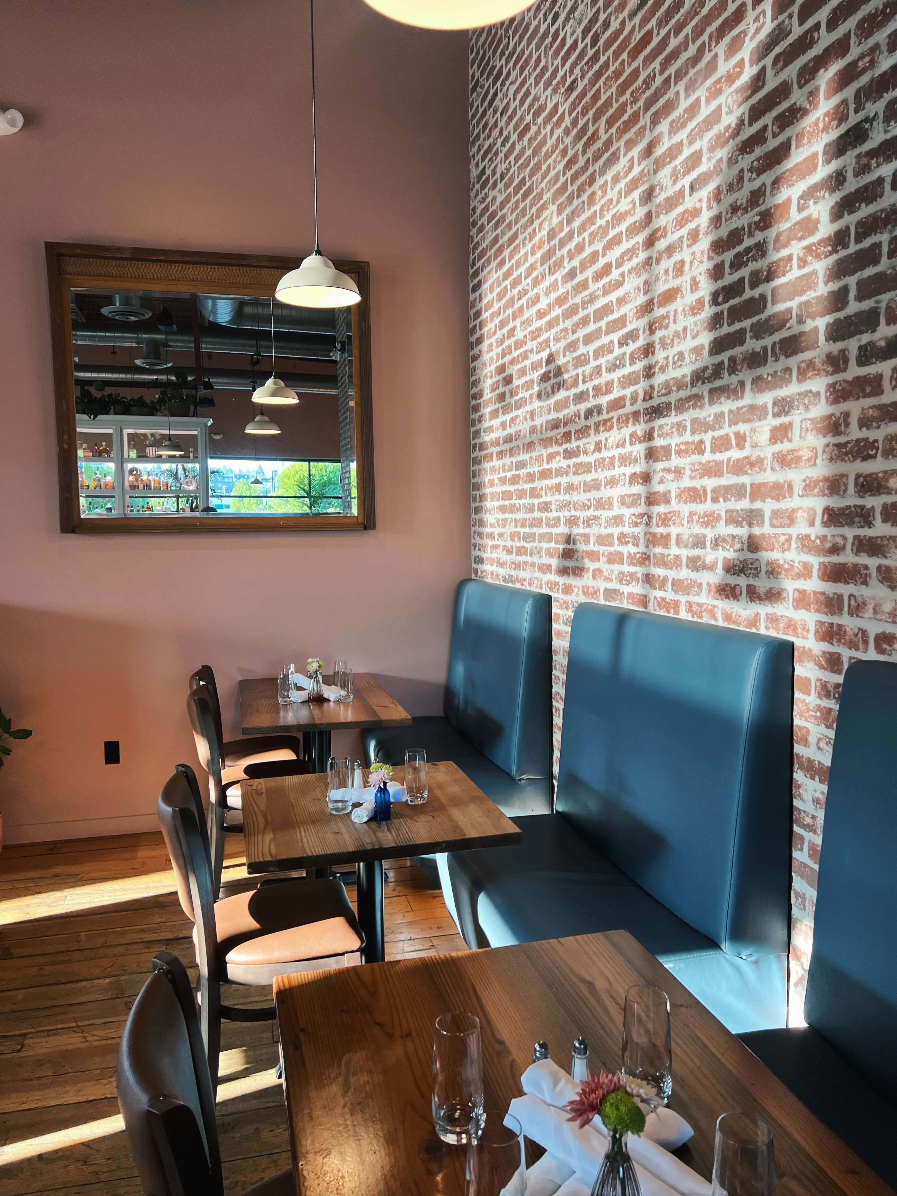 Delicious gourmet burger with fresh toppings on a wooden table