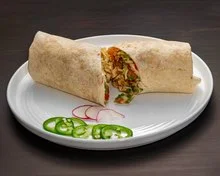 Delicious chicken burrito served with fresh jalapeños