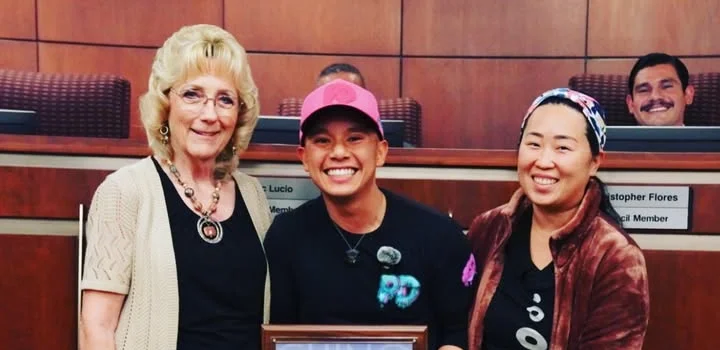 Founder Danny Truong excepting Business of the Month from the city of Chino.
