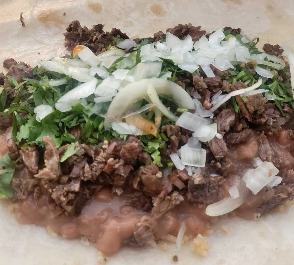 Authentic Mexican street taco with beef and fresh toppings
