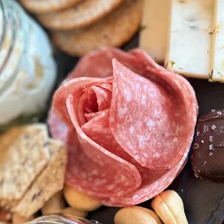 Charcuterie board with assorted meats and cheeses