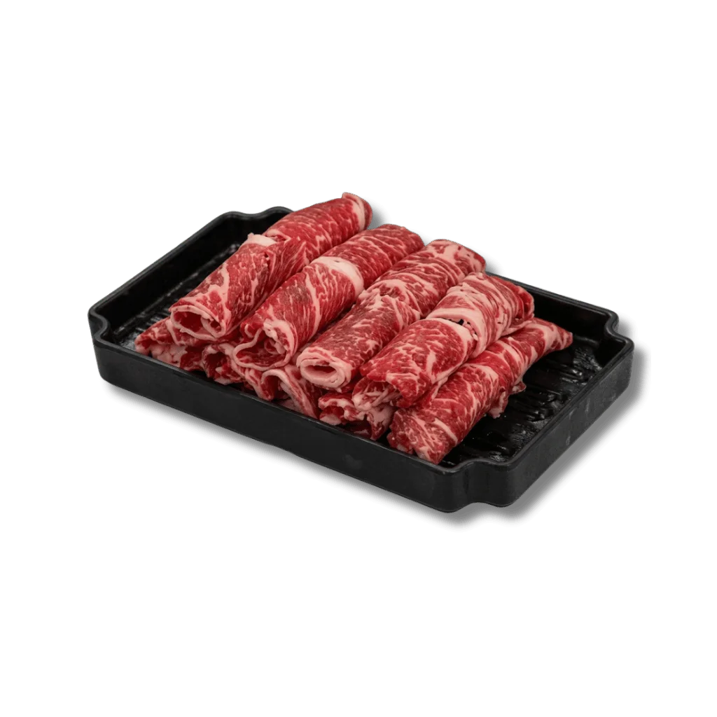 Thinly sliced marbled beef arranged in a black tray.