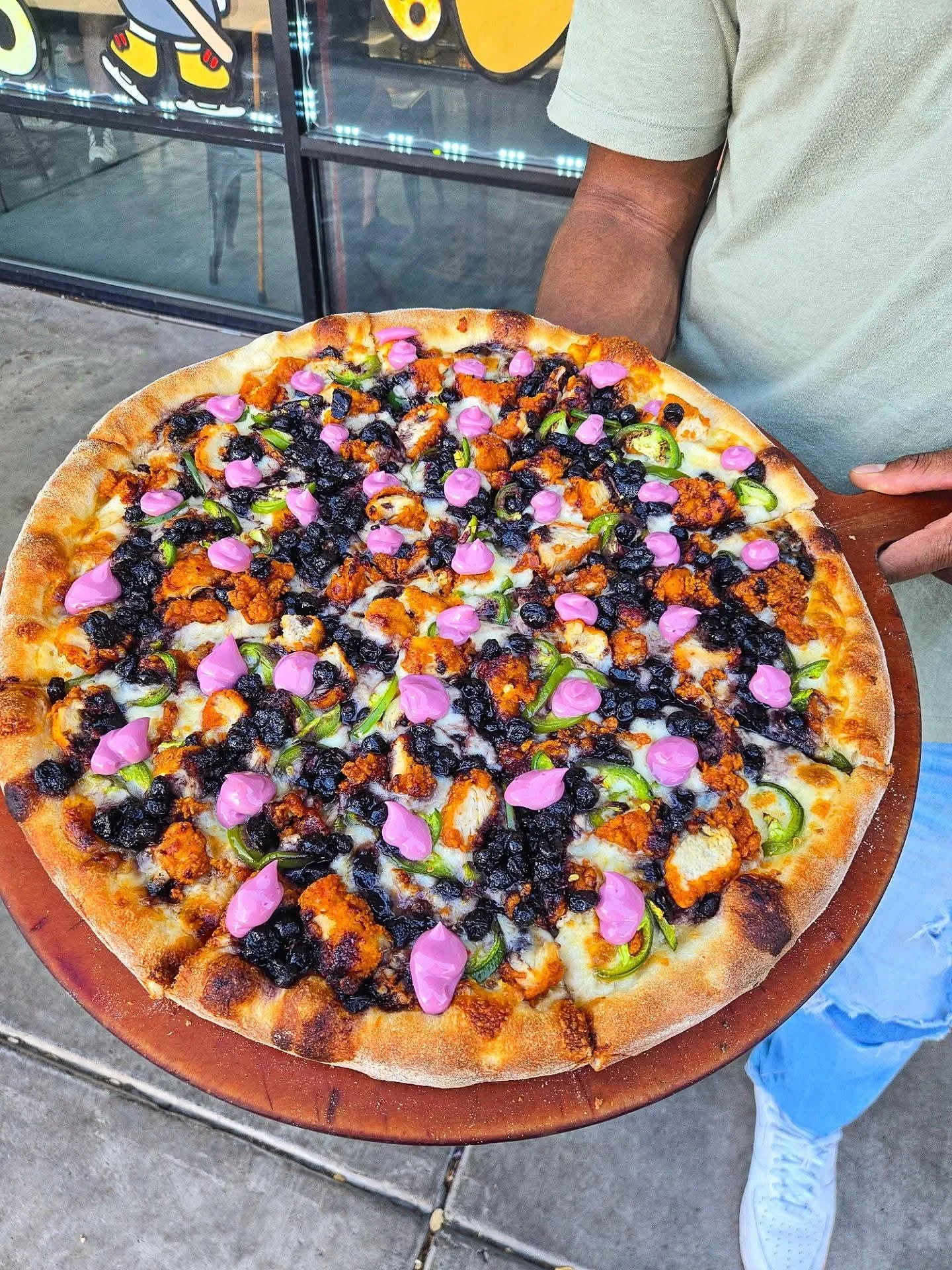 Loaded pizza with shrimp and bacon, a fusion delight