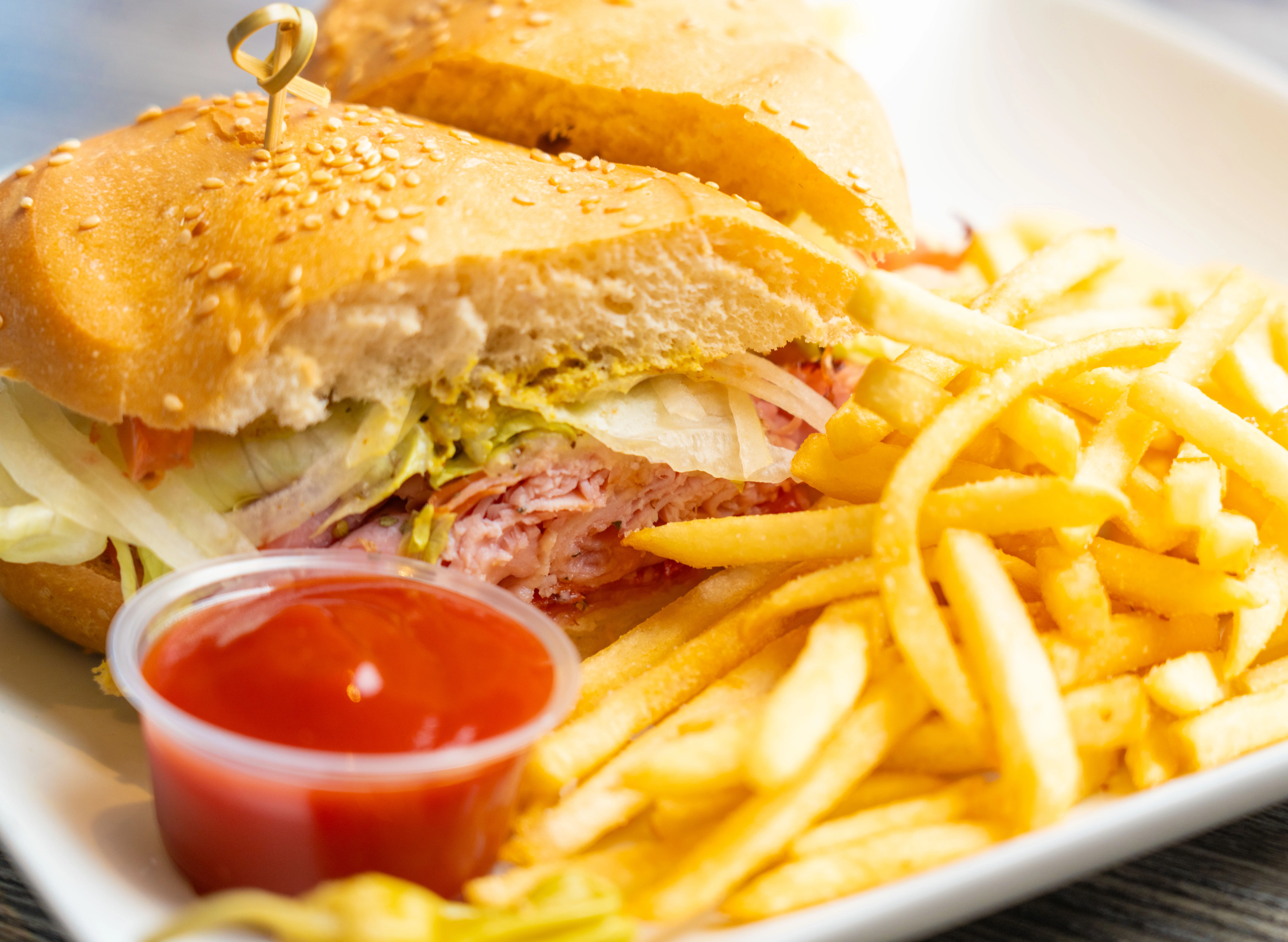 Classic American sandwich with fries and ketchup