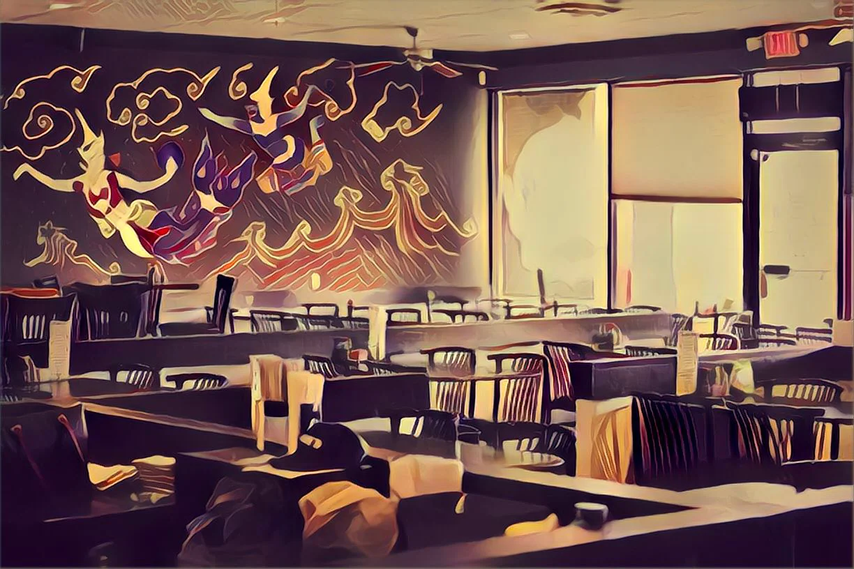 Stylish restaurant interior with artistic mural and modern seating