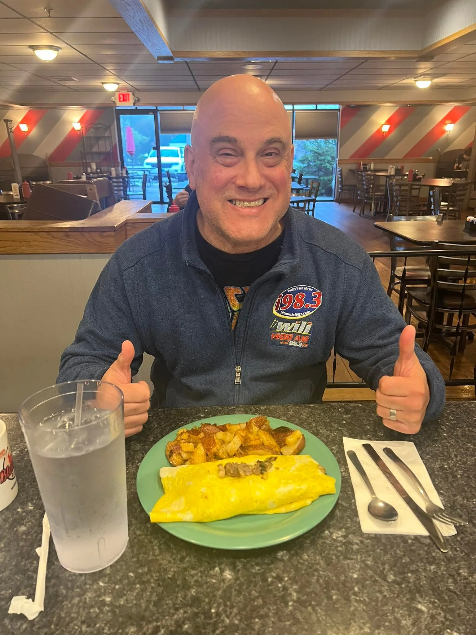Delicious American breakfast omelette with home fries